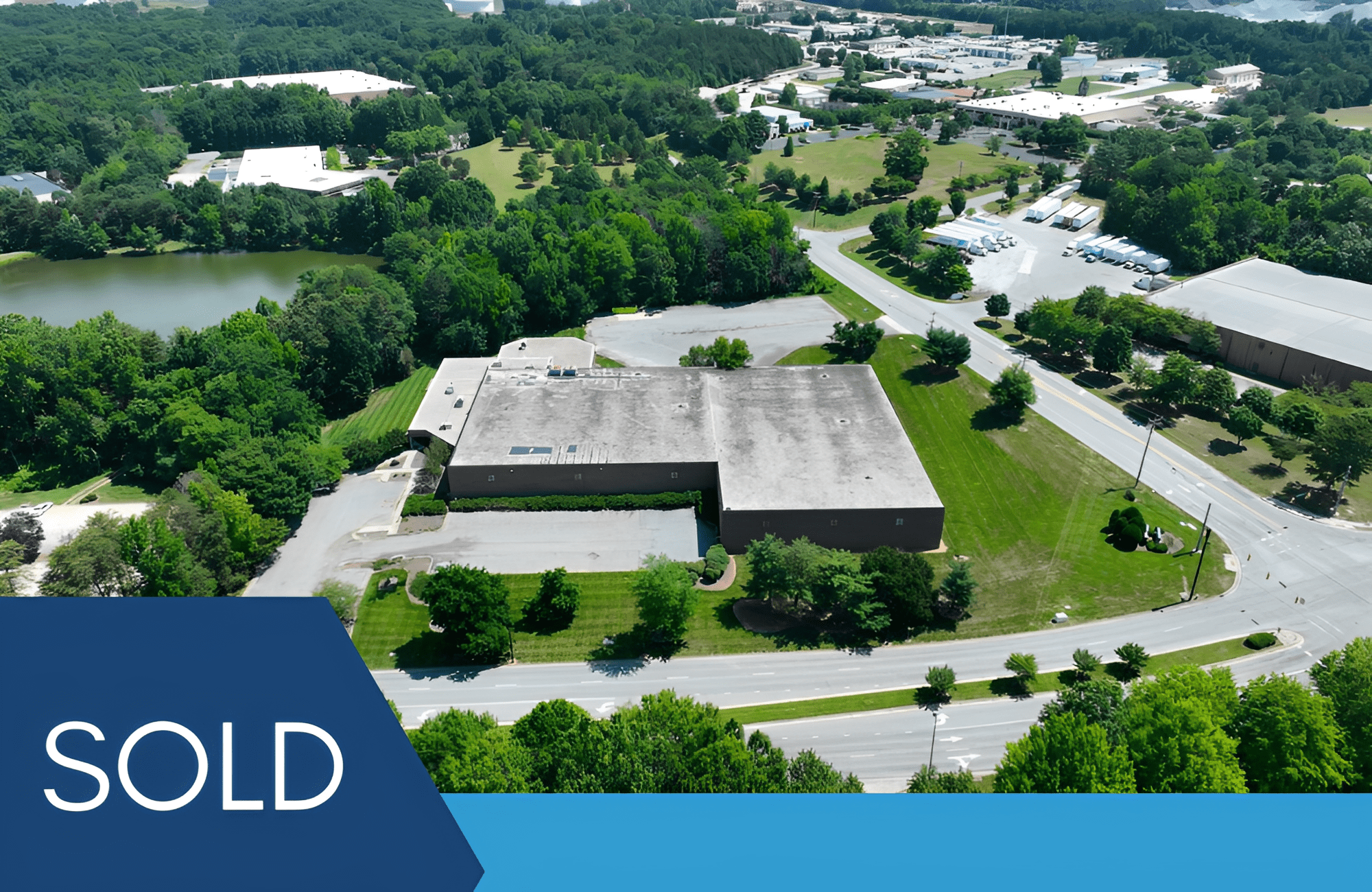 Aerial view of sold industrial building.